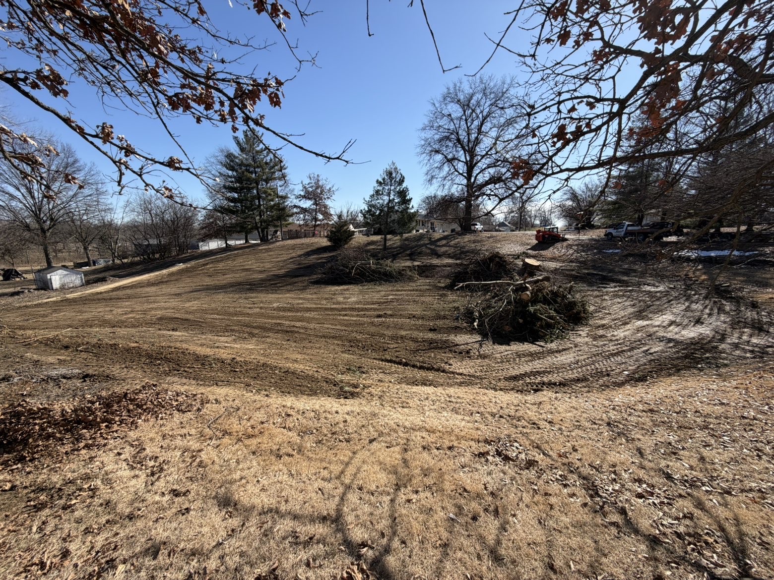 Graded yard after pond fill, in-town Missouri — Emanuel Excavation
